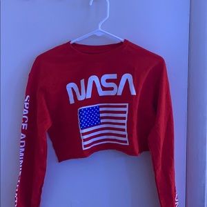 A NASA long sleeve cropped graphic tee.